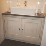 Aged Vanity Unit with black stipple finish granite. Knights Country Kitchens