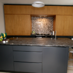 This Contemporary Town House required an ultra modern design with dark grey kitchen cupboards coupled with beautiful Oak surrounds.