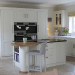 This Simply Elegant hand-made kitchen is absolutely beautiful. White, Oak and black granite worktops. Designed and manufacture in our workshop in Suffolk.