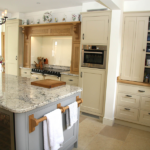 Take a look at this Timeless Trio Kitchen offering excellent bespoke design, manufacture and fitting. Soft creams and greys coupled with beautiful marble and oak. Farrow & Ball paint and Delactus cream granite for the island and glass for the inglenook. Bespoke Kitchens Suffolk