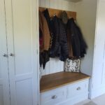 As Autumn is upon us and winter fast approaching a Boot room is a useful space to hang damp coats and store muddy boots. Call us with your ideas.